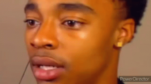 A Close Up Of A Person 'S Face With A Surprised Look On It . GIF