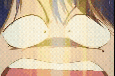 A Close Up Of A Person 'S Face With A Surprised Look On It GIF