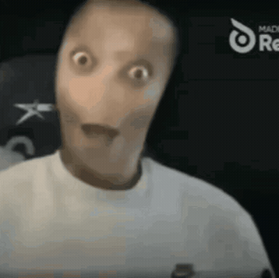 A Close Up Of A Person 'S Face With A Surprised Look On It . GIF
