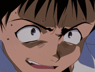 A Close Up Of A Person 'S Face With A Surprised Look On Their Face GIF