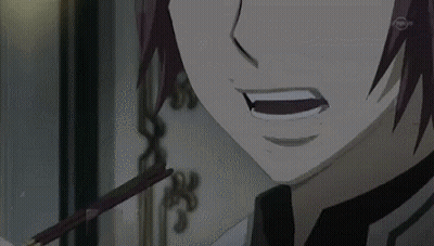 A Close Up Of A Person 'S Face With A Sword In His Mouth . GIF