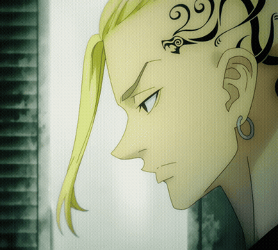 A Close Up Of A Person 'S Face With A Tattoo On Their Forehead GIF