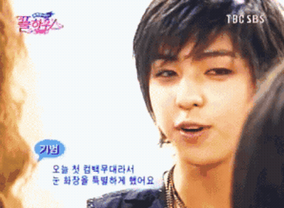 A Close Up Of A Person 'S Face With A Tbc Sbs Logo On The Bottom GIF