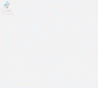 A Close Up Of A Person 'S Face With A Tiktok Logo In The Corner . GIF