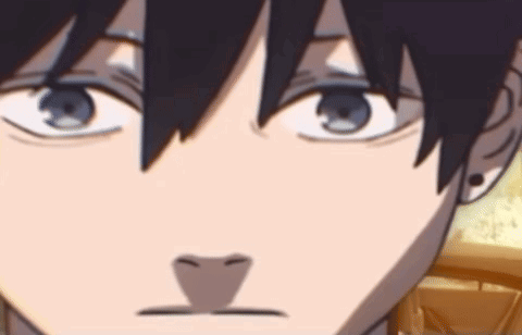 A Close Up Of A Person 'S Face With A Triangle In The Middle Of It . GIF
