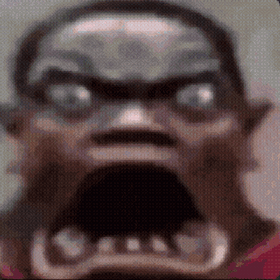 A Close Up Of A Person 'S Face With A Very Angry Look On It . GIF