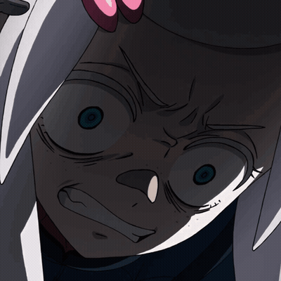 A Close Up Of A Person 'S Face With A Very Angry Look On Their Face GIF
