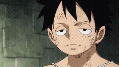 A Close Up Of A Person 'S Face With A Very Tired Look On It GIF