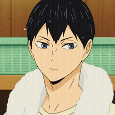 A Close Up Of A Person 'S Face With A White Towel Around Their Neck . GIF