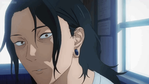 A Close Up Of A Person 'S Face With A Window In The Background . GIF