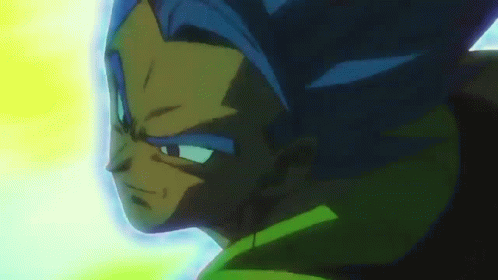 A Close Up Of A Person 'S Face With A Yellow Background GIF