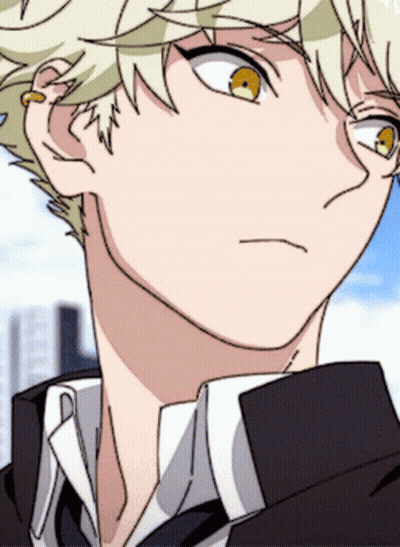 A Close Up Of A Person 'S Face With A Yellow Eye GIF