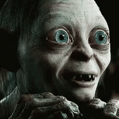 A Close Up Of A Person 'S Face With Big Blue Eyes GIF