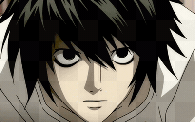 A Close Up Of A Person 'S Face With Big Eyes GIF