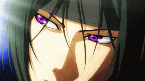 A Close Up Of A Person 'S Face With Black Hair And Purple Eyes GIF