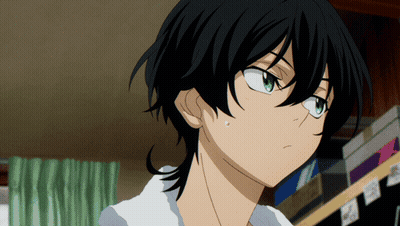A Close Up Of A Person 'S Face With Black Hair GIF