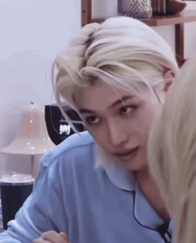 A Close Up Of A Person 'S Face With Blonde Hair GIF