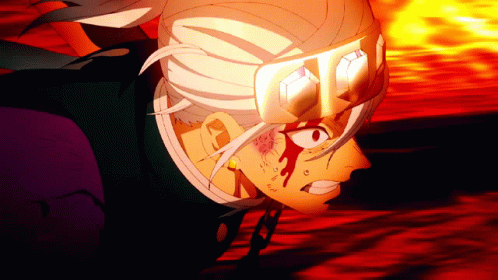 A Close Up Of A Person 'S Face With Blood Coming Out Of Their Eyes GIF