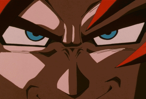 A Close Up Of A Person 'S Face With Blue Eyes GIF