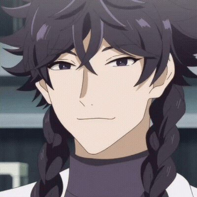 A Close Up Of A Person 'S Face With Braids On Their Hair GIF