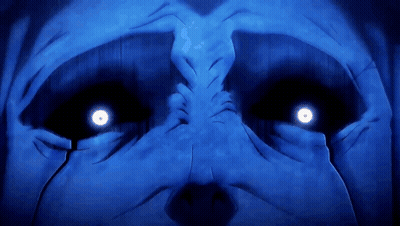 A Close Up Of A Person 'S Face With Bright Blue Eyes GIF