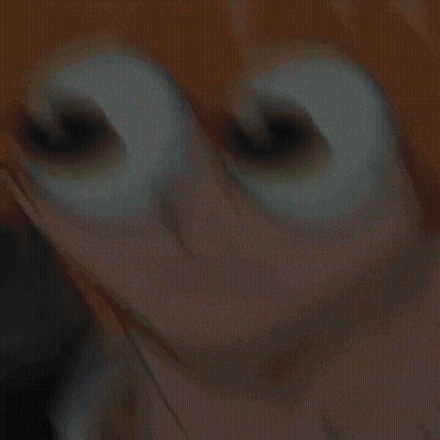A Close Up Of A Person 'S Face With Cartoon Eyes GIF
