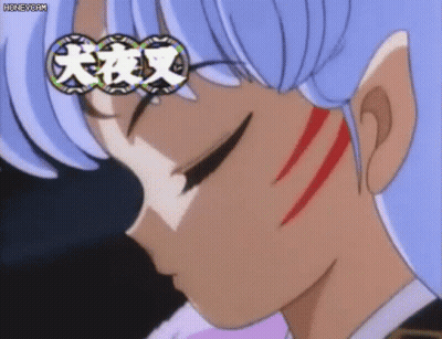 A Close Up Of A Person 'S Face With Chinese Writing On The Bottom GIF