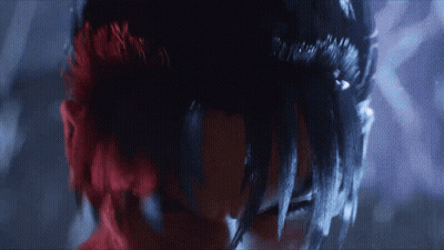 A Close Up Of A Person 'S Face With Dark Hair GIF