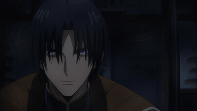 A Close Up Of A Person 'S Face With Dark Hair And Blue Eyes GIF