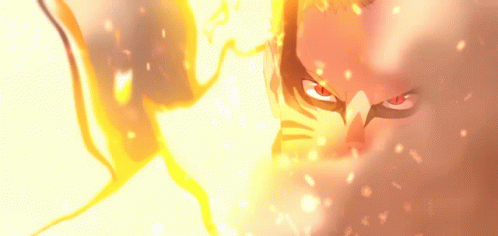 A Close Up Of A Person 'S Face With Fire Coming Out Of It 'S Eyes . GIF