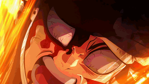 A Close Up Of A Person 'S Face With Flames Behind Him GIF