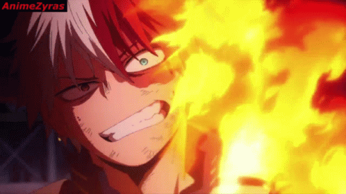 A Close Up Of A Person 'S Face With Flames Coming Out Of It GIF