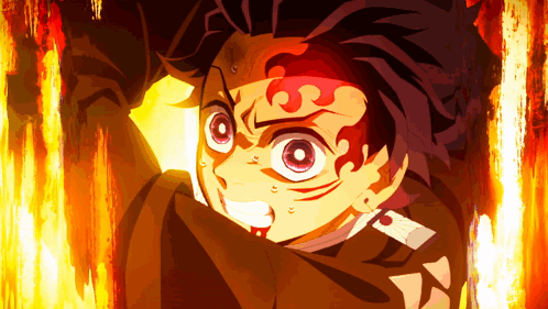 A Close Up Of A Person 'S Face With Flames Coming Out Of It GIF
