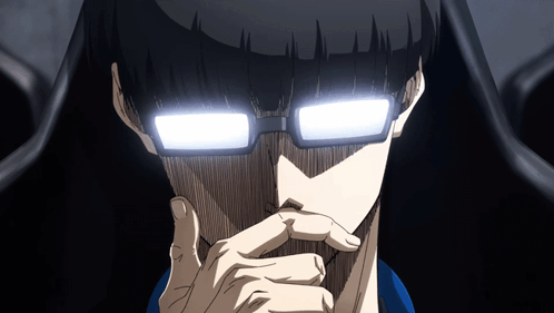 A Close Up Of A Person 'S Face With Glowing Eyes GIF
