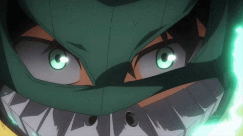 A Close Up Of A Person 'S Face With Glowing Eyes GIF