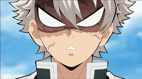 A Close Up Of A Person 'S Face With Gray Hair GIF