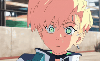 A Close Up Of A Person 'S Face With Green Eyes GIF