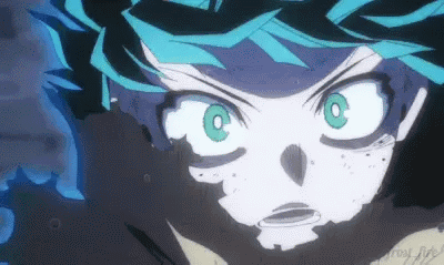 A Close Up Of A Person 'S Face With Green Eyes And A Black Background . GIF