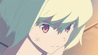 A Close Up Of A Person 'S Face With Green Hair GIF