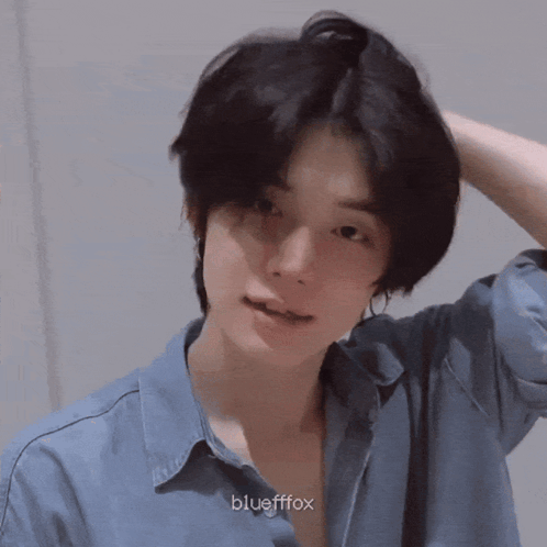 A Close Up Of A Person 'S Face With Korean Writing GIF