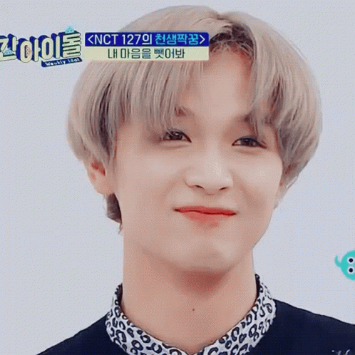 A Close Up Of A Person 'S Face With Korean Writing On The Top GIF
