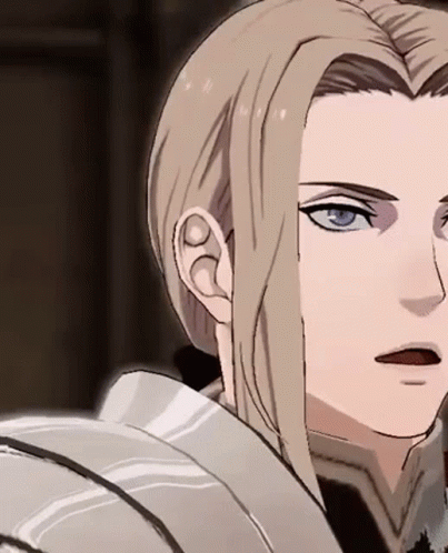 A Close Up Of A Person 'S Face With Long Blonde Hair And Blue Eyes . GIF