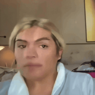 A Close Up Of A Person 'S Face With One Eye Closed GIF