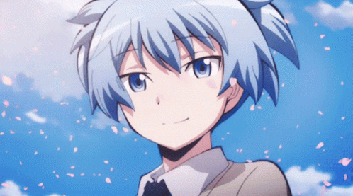 A Close Up Of A Person 'S Face With Petals Falling From The Sky GIF