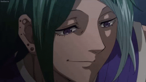 A Close Up Of A Person 'S Face With Purple Eyes GIF