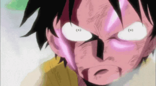 A Close Up Of A Person 'S Face With Purple Eyes GIF