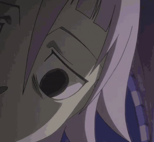 A Close Up Of A Person 'S Face With Purple Hair GIF
