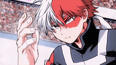 A Close Up Of A Person 'S Face With Red And White Hair GIF