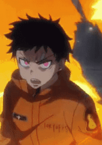 A Close Up Of A Person 'S Face With Red Eyes And A Yellow Background GIF