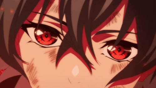 A Close Up Of A Person 'S Face With Red Eyes And Black Hair GIF